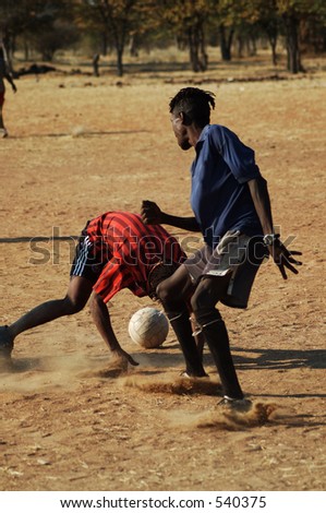 football player practising his skills on a makeshift football pitch, Namibie, Southern Africa