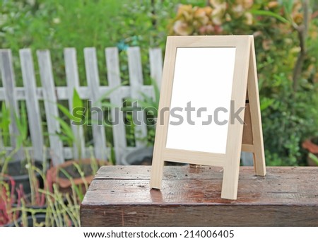 empty Wooden Whiteboard (menu board) at a coffee Shop .frame