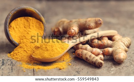 Similar – Image, Stock Photo Turmeric roots and powder in a white bowl on a grey wooden table. Close up. Spice.