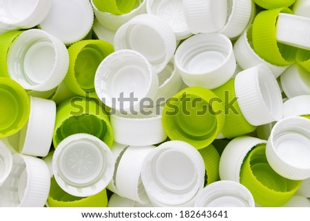 White and green plastic bottle caps