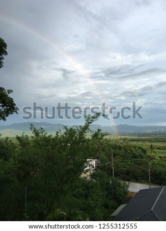 Similar – Image, Stock Photo Rainbow over a paddling pool in a garden