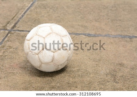 Soccer ball on the cement floor