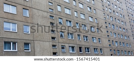 Similar – Image, Stock Photo monotonous prefabricated building facade with clouds