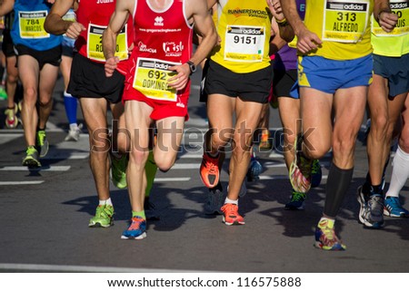 VALENCIA, SPAIN - OCTOBER 21: Runners compete in the XXI Valencia Half Marathon on October 21, 2012 in Valencia, Spain.