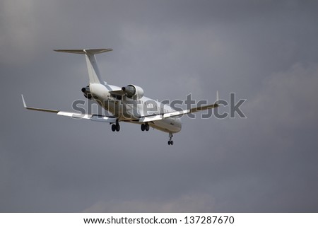 VALENCIA, SPAIN - APRIL 30: An Air Nostrum regional jet aircraft landing at the Valencia Airport on April 30, 2013 in Valencia, Spain. Air Nostrum has 91 domestic and 51 international routes.