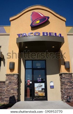JACKSONVILLE, FL - MAY 5, 2014: The front entrance of a Taco Bell fast-food restaurant in Jacksonville. Taco Bell serves more than 2 billion customers each year in more than 5,800 restaurants.