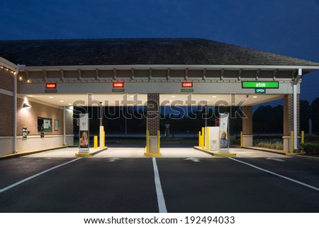 JACKSONVILLE, FL - MAY 13, 2014: A Regions Bank Drive Thru at night in Jacksonville. Regions Bank operates 1,700 branches and 2,400 ATMs across 16 southern states in the U.S.