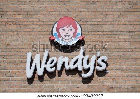 JACKSONVILLE, FL-MAY 17, 2014: A Wendy\'s Logo at one of their fast food stores in Jacksonville. Wendy\'s is the world\'s third largest hamburger fast food chain with approximately 6,650 locations.