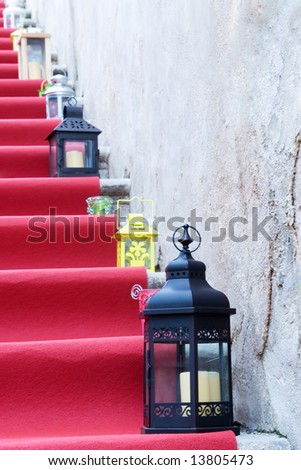 Laterns on red stairs