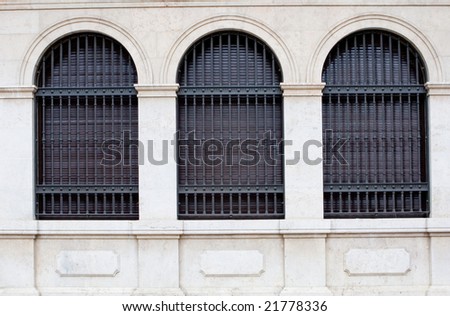 Three Arched Windows with Iron Bars