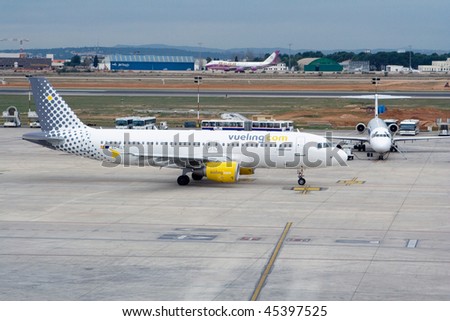 VALENCIA, SPAIN - JANUARY 26: Vueling Airlines to Operate a new route between Bilbao, Spain and Amsterdam in March 2010. A Vueling airplane taxing to the runway on January 26, 2010 in Valencia, Spain.