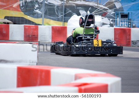 VALENCIA, SPAIN - JUNE 27: Fans participate in go-karting at the Formula 1 racing Valencia Street Circuit Beach Park on June 27, 2010 in Valencia Port, Spain
