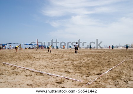 VALENCIA, SPAIN - JULY 3: Women Rugby teams participate in the City of Valencia XIV International Beach Rugby Competition on July 3, 2010 in Valencia, Spain.