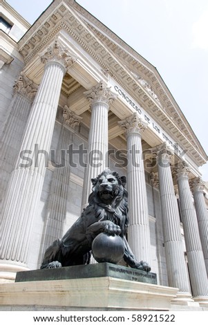 The sculpture of lion (1860) before the building of Spanish parliament in Madrid