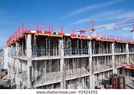 Construction Site with Crane and Scaffolding