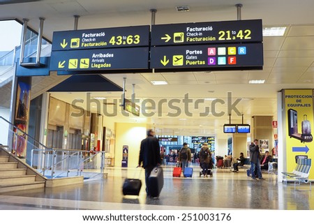 VALENCIA, SPAIN - February 7, 2015: Airline passengers inside the Valencia Airport. About 4.98 million passengers passed through the airport in 2014.