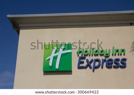 JACKSONVILLE, FLORIDA, USA - JULY 26, 2015: A Holiday Inn Express hotel sign in Jacksonville. Holiday Inn Express is a mid-priced hotel chain with over 2,300 locations worldwide.
