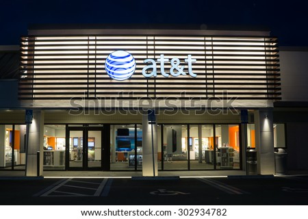 JACKSONVILLE, FLORIDA, USA - AUGUST 1, 2015: An AT&T Mobility store at night. AT&T Mobility is the second largest wireless telecommunications provider in the United States and Puerto Rico.