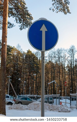 Similar – Image, Stock Photo Traffic sign prescribed driving direction straight ahead (traffic sign no. 209-30) partly covered with snow