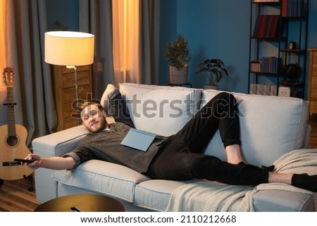 Similar – Image, Stock Photo Man lying down holding mirror with reflection