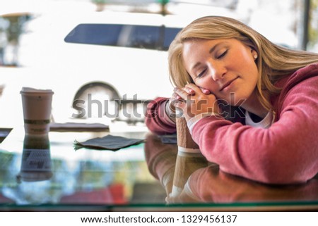 Image, Stock Photo Woman in her twenties with electric scooter recording voice note with a smartphone outdoors.