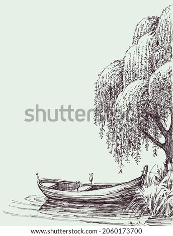 Boat on lake anchored near a willow tree