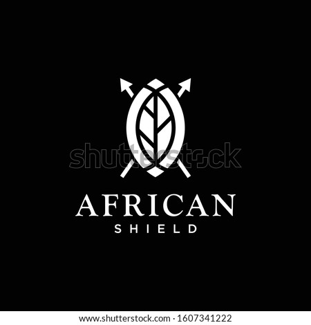 Bold logo design of african shield with leaf and black background - EPS10 - Vector.