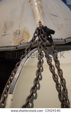 Chains securing two boats