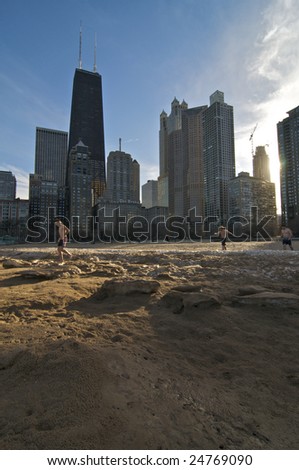 CHICAGO, IL - FEBRUARY 10: Several People take advantage of the record temperatures and go for a swim on February 10, 2009 at Oak Street Beach in Chicago, IL