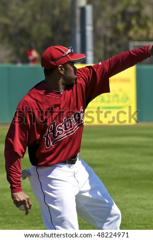 KISSIMMEE, FLORIDA - MARCH 6: Michael Bourn of the Houston Astros warms up in the outfield prior to a game against the Atlanta Braves on March 6, 2010 in Kissimmee, Florida