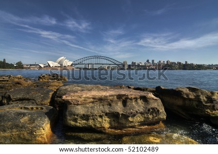 SYDNEY, AUSTRALIA - MARCH 18:  The Sydney Opera House and Harbor Bridge from a Viewpoint across Sydney Harbor on March 18, 2010 in Sydney, Australia