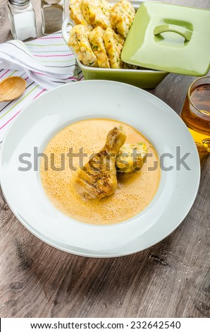 Chicken with red pepper sauce with original czech dumplings and beer.