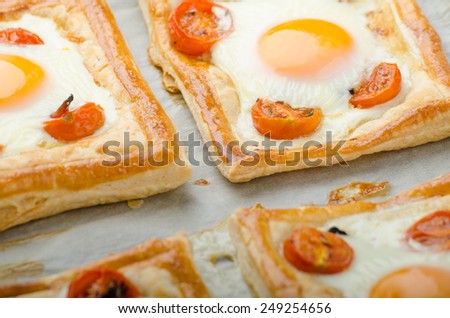 Tomato, Egg, and Prosciutto Tart from puff pastry, baked in oven