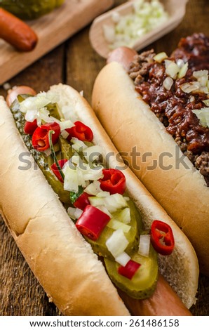 Chilli and vegetarian hot dog, home pickles, beef meat and homemade barbeque souce