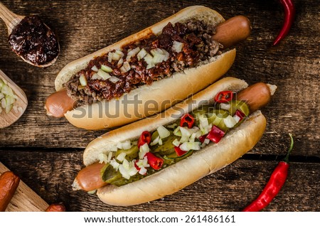 Chilli and vegetarian hot dog, home pickles, beef meat and homemade barbeque souce