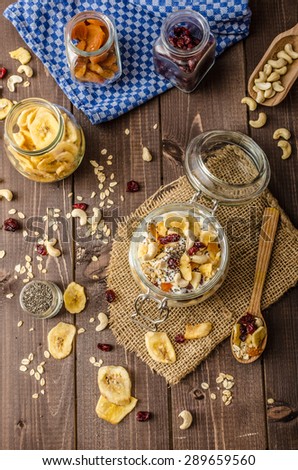 Homemade yogurt with granola, dried fruit and nuts bio - cia seed - most healthy seed, apricot and banana dried fruit