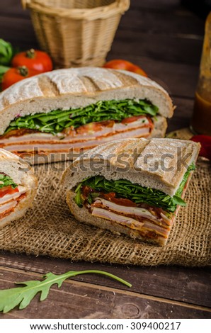 Italian Pressed Sandwich - full of tasty. Italian ham and cheese, spinach, homemade chips side dish