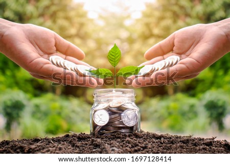 Similar – Image, Stock Photo Two hands put leaves into a fast foaming flowing river.