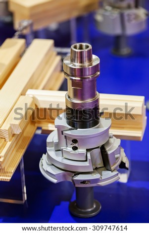 close up of stainless steel and aluminum  woodworking machine