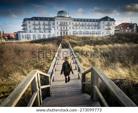 JUIST, GERMANY - MARCH 30, 2015: The Kurhaus, also called the white castle. Today it is a hotel with a wellness center on JUIST, MARCH 30, 2015.
