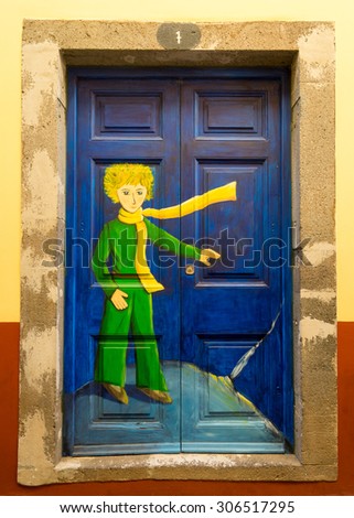 FUNCHAL, PORTUGAL - July 15: The art of open door in the street of Santa Maria. A project which aims to \