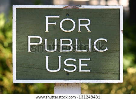 A carved green sign reading For Public Use