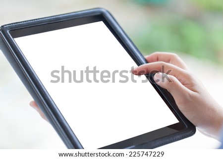 female teen hands using tablet with white screen, outdoor