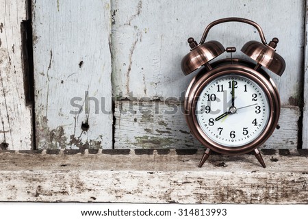 Retro alarm clock with old wood Vintage style with grey color