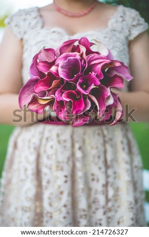 Bouquet of orchids holding by the future bride