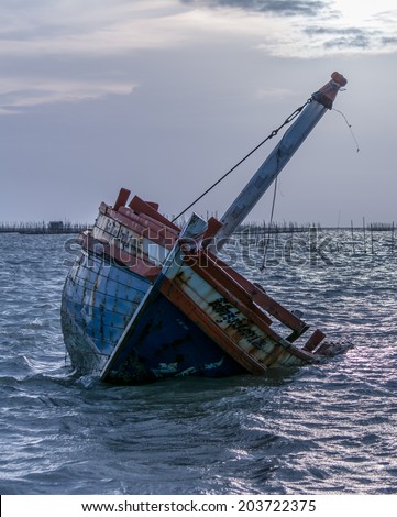 Closeup Boat capsized in the Sea