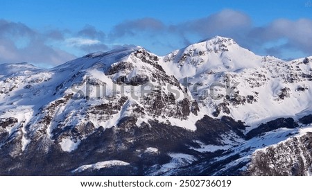 Similar – Image, Stock Photo Valley in snowy mountain range