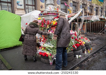 Kyiv - February 23: Flowers in memory of murdered on Euromaidan. Ukrainian protests, February 23, 2014 in Kyiv