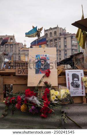Kyiv - February 23: Flowers in memory of murdered on Euromaidan. Ukrainian protests, February 23, 2014 in Kyiv