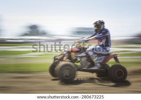 In a race quod competitor hurtling at full speed
